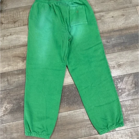 Acne Studios faded green appliqué cotton jersey track pant sweatpants